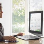 Woman at desk patient dashboard