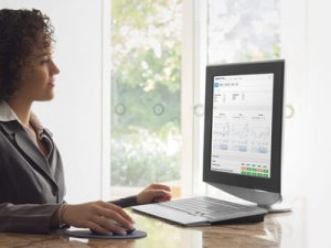 Woman at desk patient dashboard